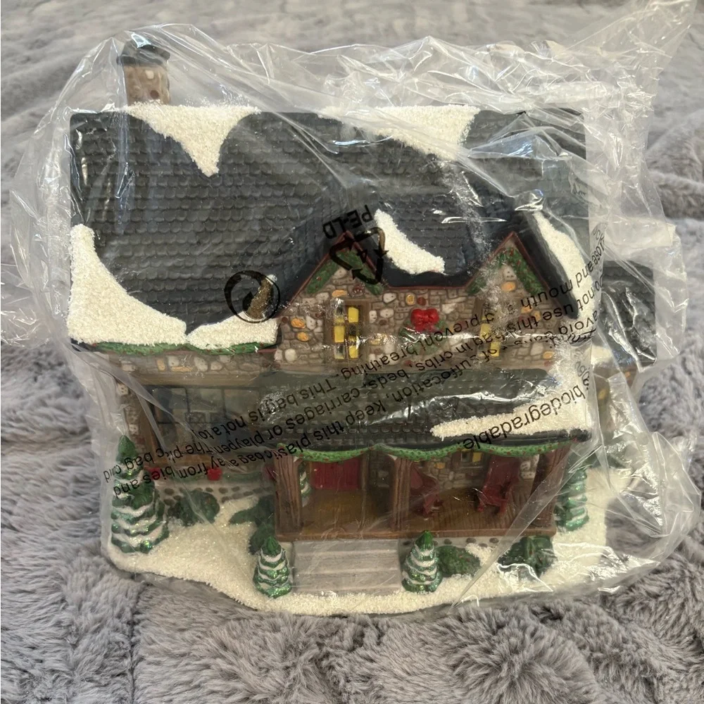 The Village Collection St.‎ Nicholas Square Stone Cabin Light Up Christmas